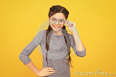 Glasses she likes the look of. Happy girl with intellectual look. Beauty look of little child. Eye care. Ophthalmologic Stock Photo