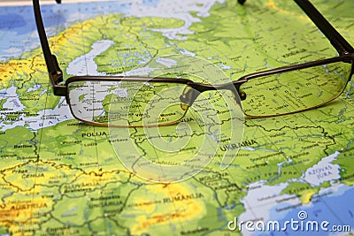 Glasses on a map of europe Cartoon Illustration