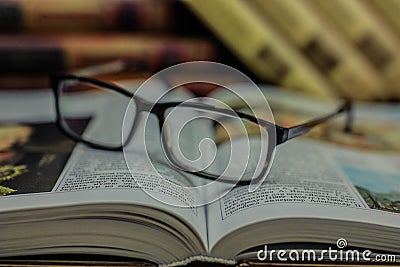 Glasses on the open book Stock Photo