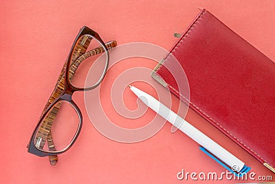 Glasses, pen and notebook business woman schedule concept background Stock Photo