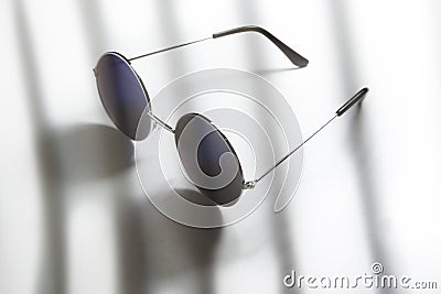 The Glasses purple circle Put on the table with white gloss some shade. Eta a beautiful and good rhythm Stock Photo