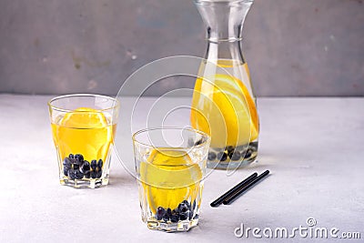 Glasses of Refreshing Infused Water with Fresh Organic Berries and Citrus Detox Healthy Drink Strew Horizontal Stock Photo