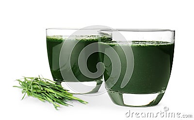 Glasses of spirulina drink and wheat grass Stock Photo