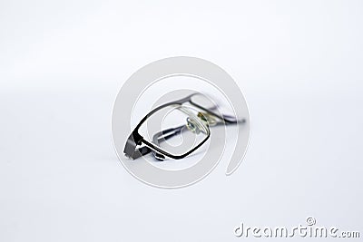 Glasses for the visually impaired, poorly sighted.glasses with aspherical astigmatic lenses in black frame on a white background. Stock Photo