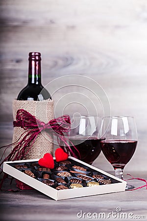 Glasses of wine and chocolates Stock Photo