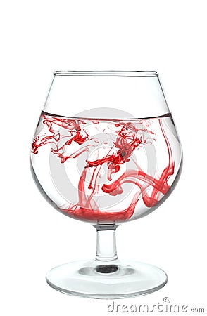 Glassfull of water with red stains Stock Photo