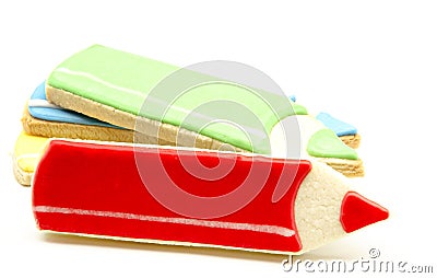 Glazed cookies shaped crayon Stock Photo