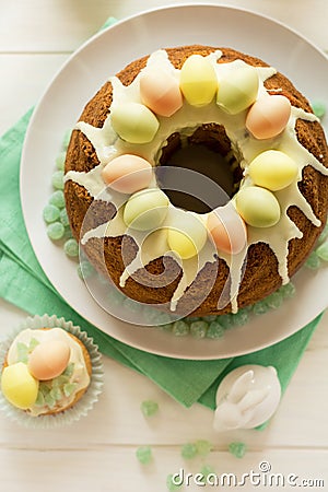 Glazed Easter cake decorated candy eggs Stock Photo