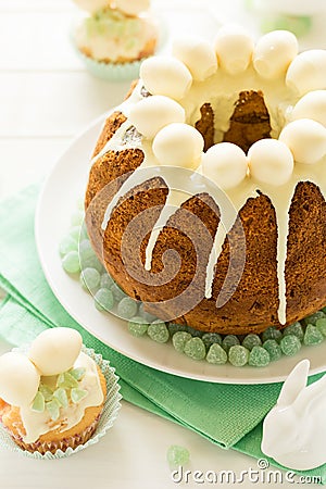 Glazed Easter cake decorated candy eggs Stock Photo