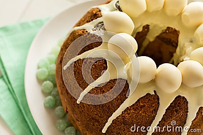 Glazed Easter cake decorated candy eggs Stock Photo