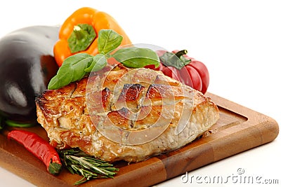 Glazed Roast Pork with vegetables Stock Photo