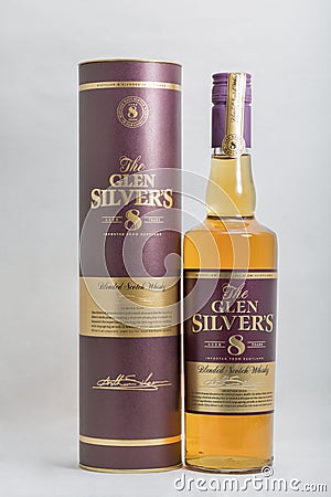 Glen Silver`s aged 8 years blended scotch whisky bottle and box closeup against white Editorial Stock Photo