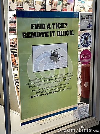 Glencoe, Scotland, UK, January 26th 2022, Tick removal health and safety poster for Lyme disease Editorial Stock Photo