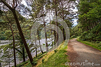 Glendalough lake Ireland sunset sun light Irish landmark Stock Photo