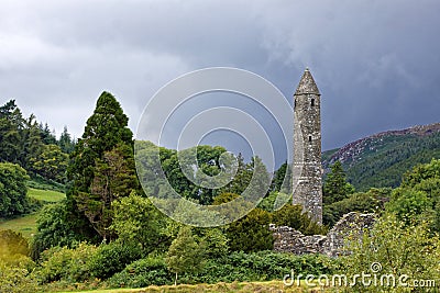 Glendalough, Monastic Tower , 6th century Old Tower, Wicklow Mountains, Ireland Editorial Stock Photo