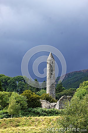 Glendalough Monastic Tower, Wicklow Mountains, Ireland Editorial Stock Photo