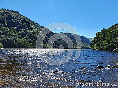 Glendalough upper lake sunny day Stock Photo