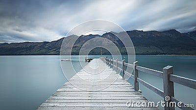 Glenorchy wharf wooden pier and lamp after sunrise, South island of New Zealand Stock Photo