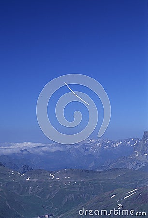 Glider plane turning over Pyrenees mountain Stock Photo