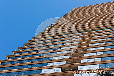 Glimpse of the Facade of a Skyscraper Seen from Below, Barcelona, Spain Stock Photo