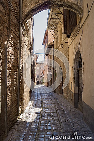 Glimpse with Romanesque arch Stock Photo