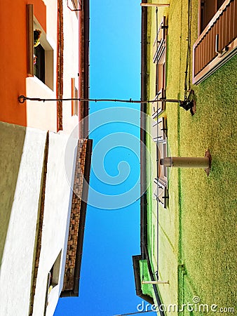 Glimpse of the sky between the houses of the historic center of Spoltore Stock Photo