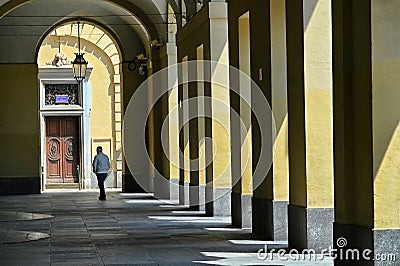 Glimpse of typical arcades in Castle square Turin Italy Editorial Stock Photo