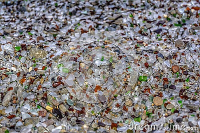 Glistening, colorful, hidden gems of beach glass Stock Photo