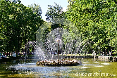 A glistening spraying fountain Stock Photo