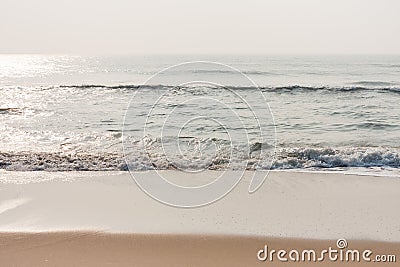 Glistening water on beach Stock Photo