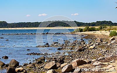 Glistening waters near a group of rocky islands in Rugen island, Germany Stock Photo