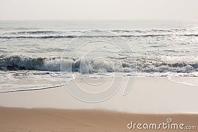 Glistening waves on beach Stock Photo