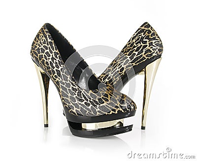 Glitter black shoes with gold heels Stock Photo