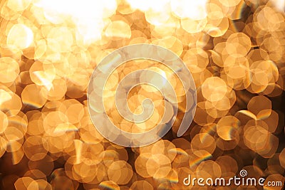 Glitter festive christmas lights background. light and gold defocused texture Stock Photo