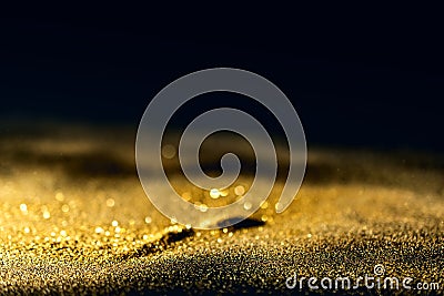 Glitter lights grunge background, gold glitter defocused abstract Twinkly Lights Background. Stock Photo