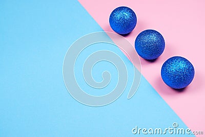 Glitter spheres on pink and blue background Stock Photo