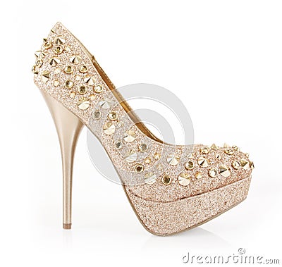 Glitter spiked gold shoe Stock Photo