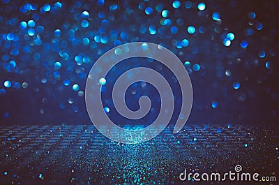 glitter vintage lights background. black, blue and silver. de-focused. Stock Photo