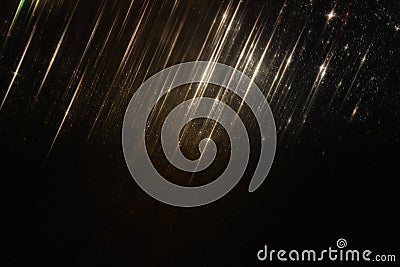 glitter vintage lights background. black and gold. de-focused. Stock Photo