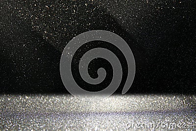 glitter vintage lights background. black and silver. de-focused. Stock Photo