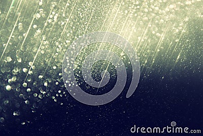 Glitter vintage lights background. gold, silver, blue and black. de-focused. Stock Photo