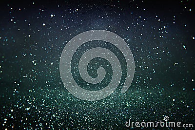 Glitter vintage lights background. gold, silver, blue and black. de-focused. Stock Photo