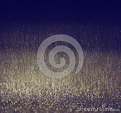 Glitter vintage lights background. gold, silver, blue and black. de-focused. Stock Photo