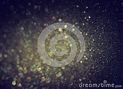 Glitter vintage lights background. light gold and black Stock Photo