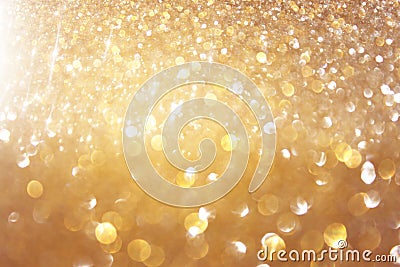 Glitter vintage lights background. light gold and black. defocused. Stock Photo