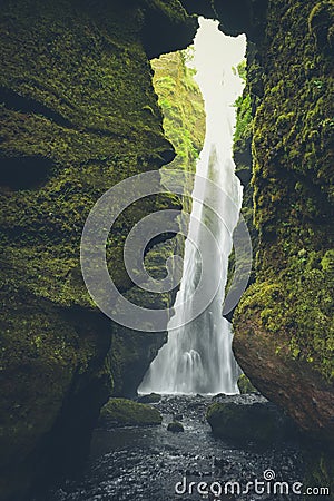 Gljufrabui waterfall & x28;Iceland& x29; hidden in cave in summer. Stock Photo