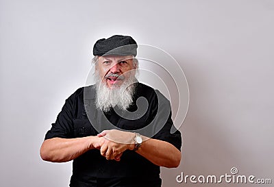 Gloating old man anticipating misfortune for others Stock Photo