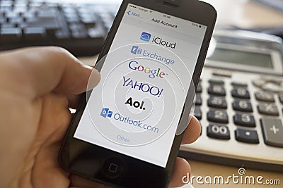 Global email services on iphone 5S Editorial Stock Photo