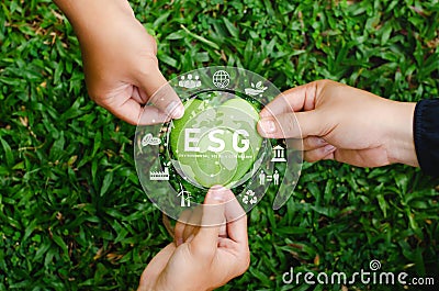 Global ESG icon concept with teamwork. Contribute to saving the environment in a heart shape and in a sustainable business on Stock Photo