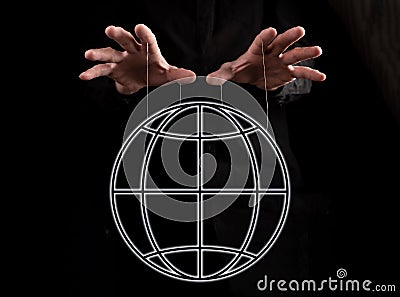 Global manipulation. Hands holding earth by strings. Government, press trying to exert influence on people, corporations Stock Photo